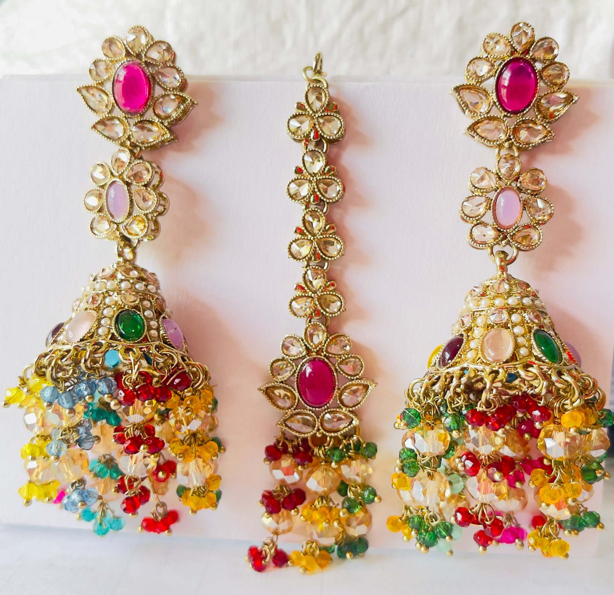 Satrangi Jhilmil Bahaar multicolored stone jhumka and maangtika set with vibrant traditional design