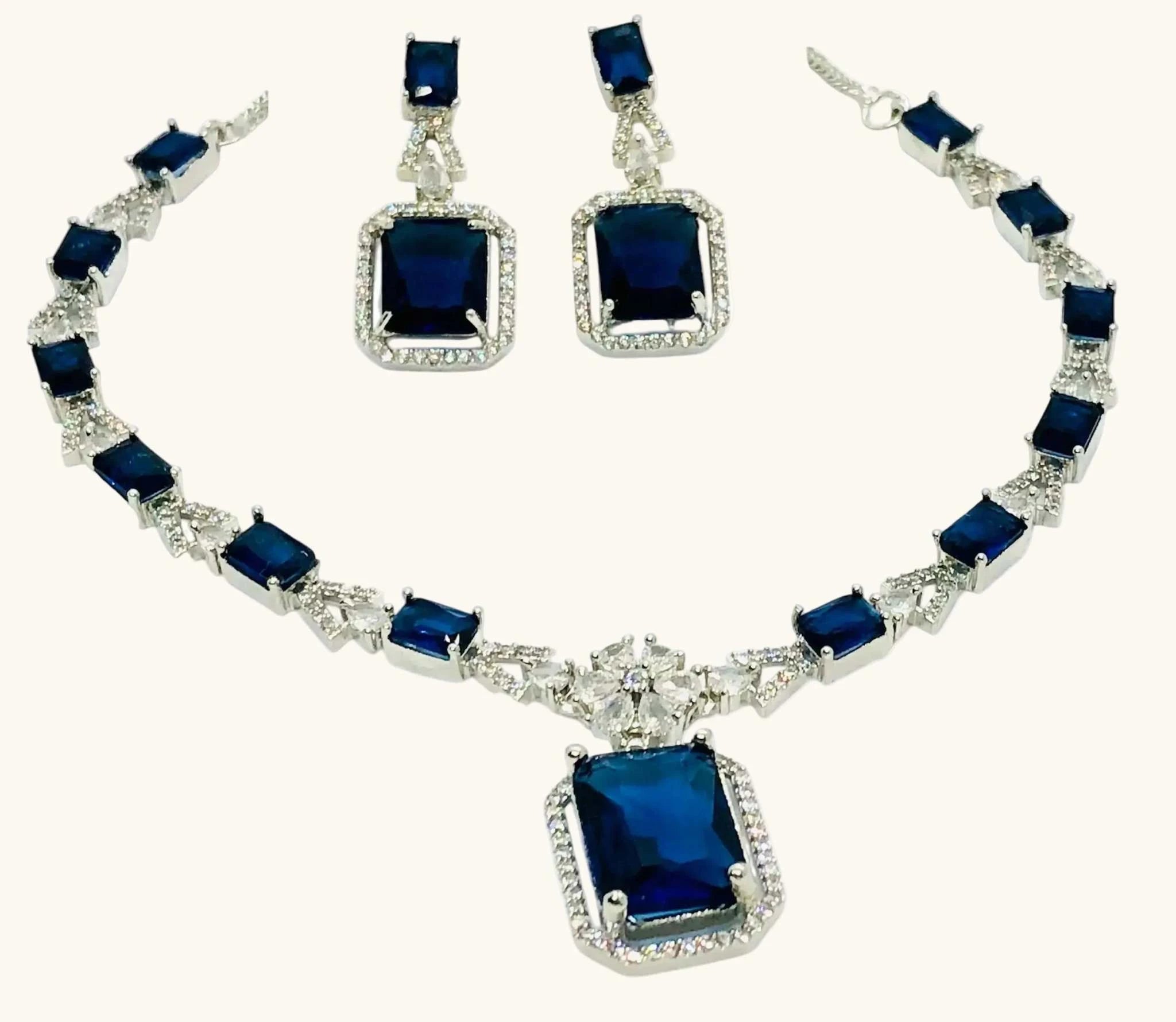 Indigo blue square crystal pendant necklace and matching earrings set with silver accents