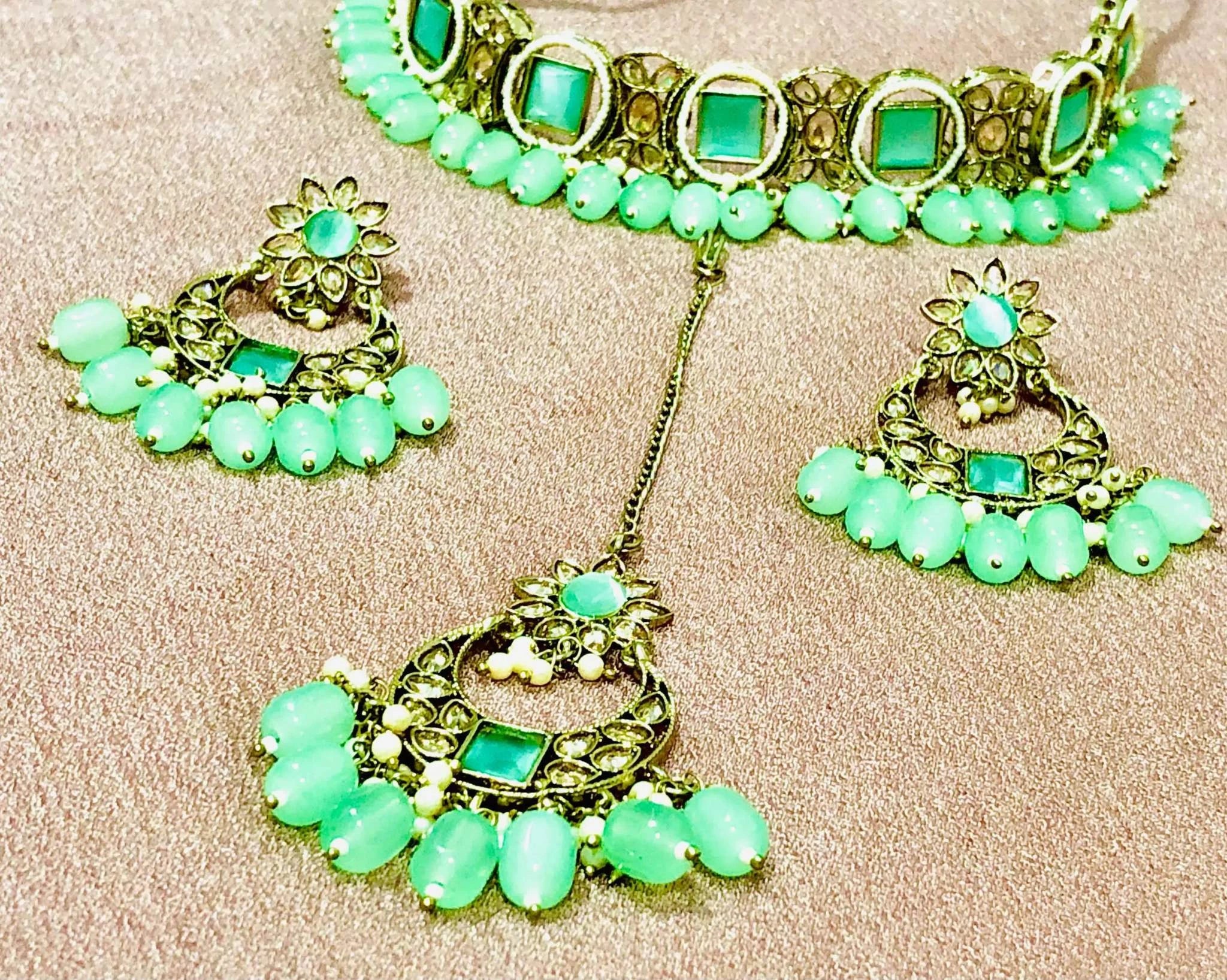 Grape Green Rajawadi Jewelry Set featuring antique finish choker and matching earrings with green beads and intricate gold detailing