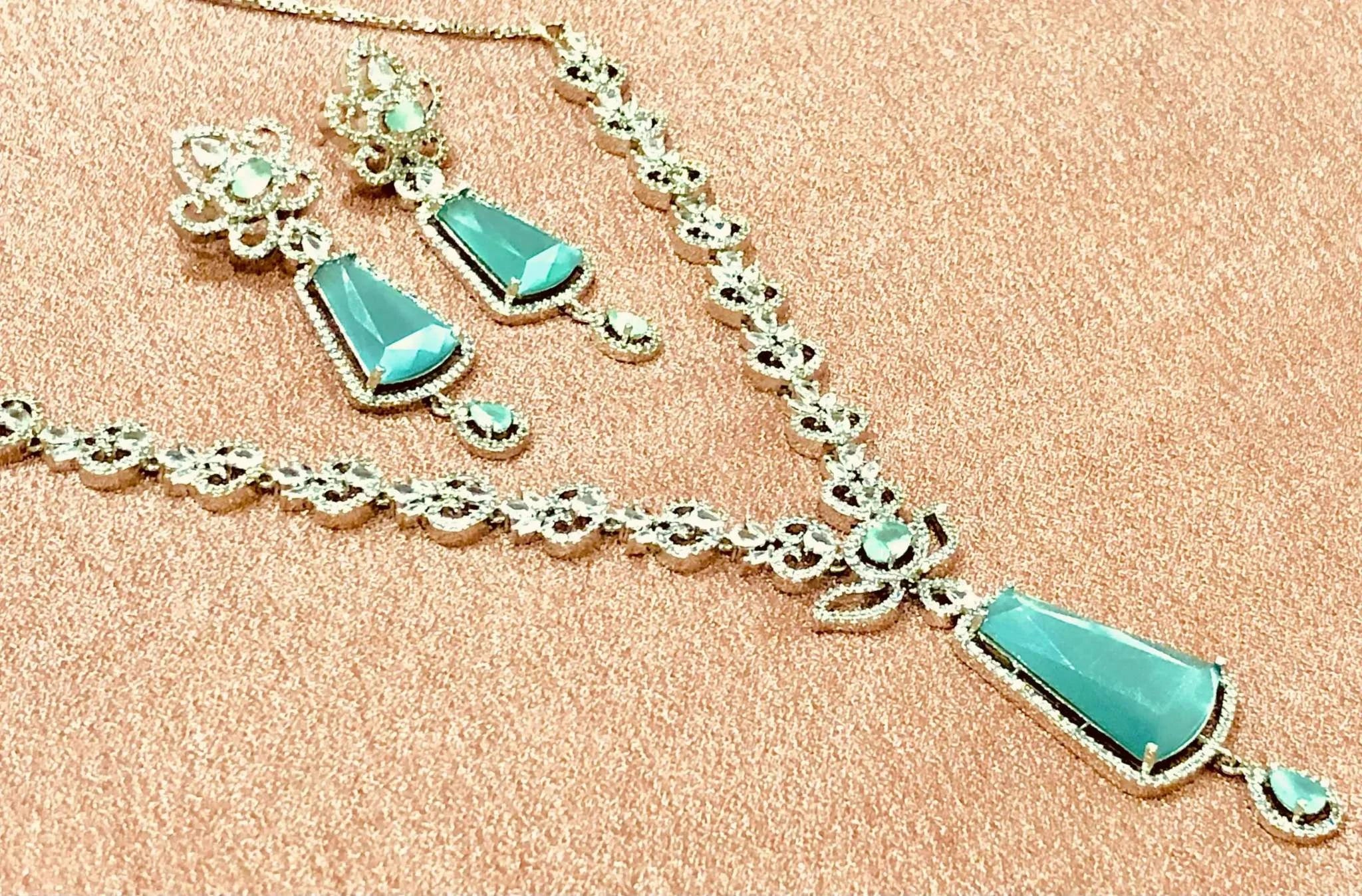 Maisha Jewels sapphire necklace and earrings set with white crystals on gold chain