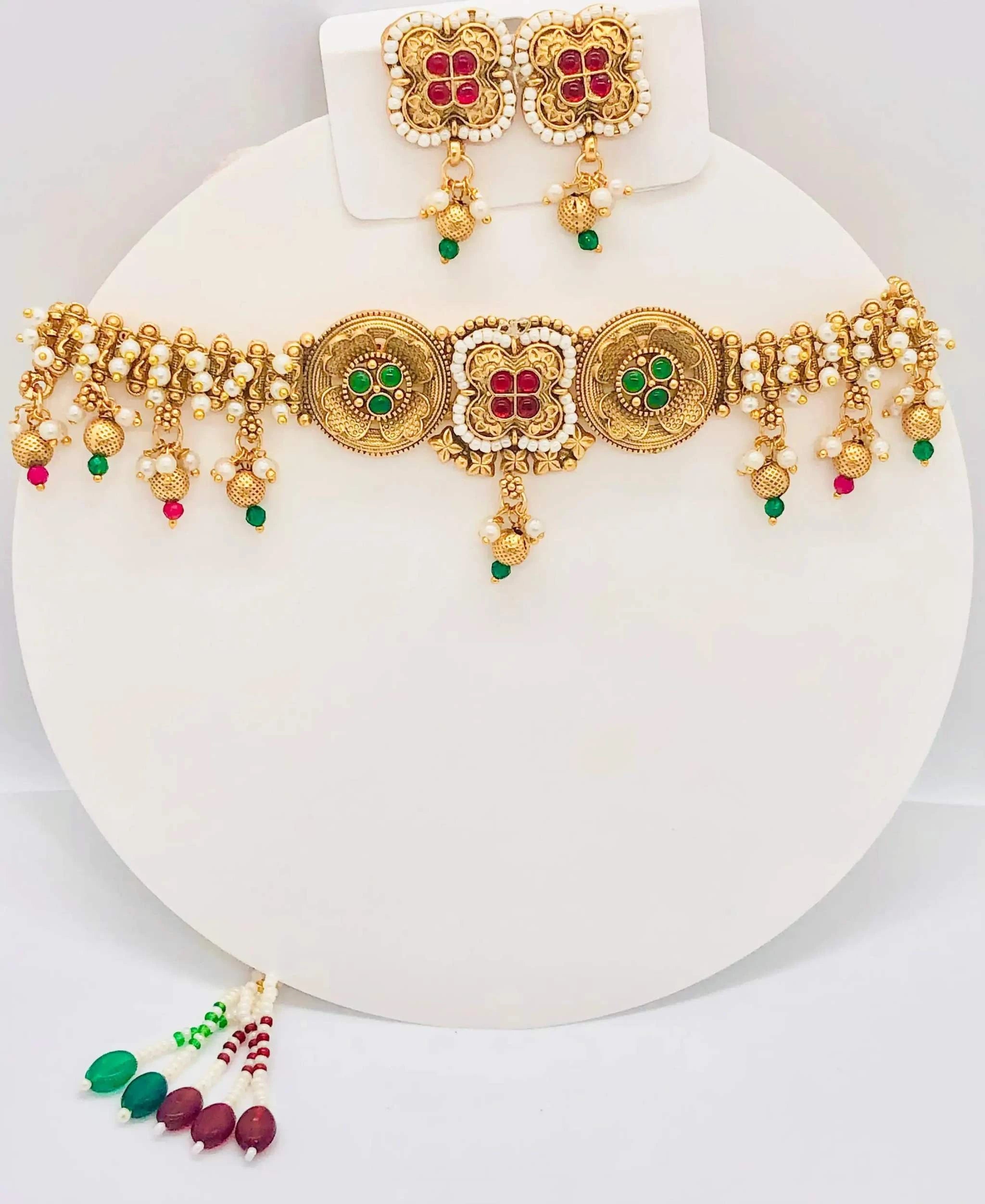 Golden Rajwadi Mehandi necklace and matching earrings with intricate traditional design and colorful stones for weddings and special occasions