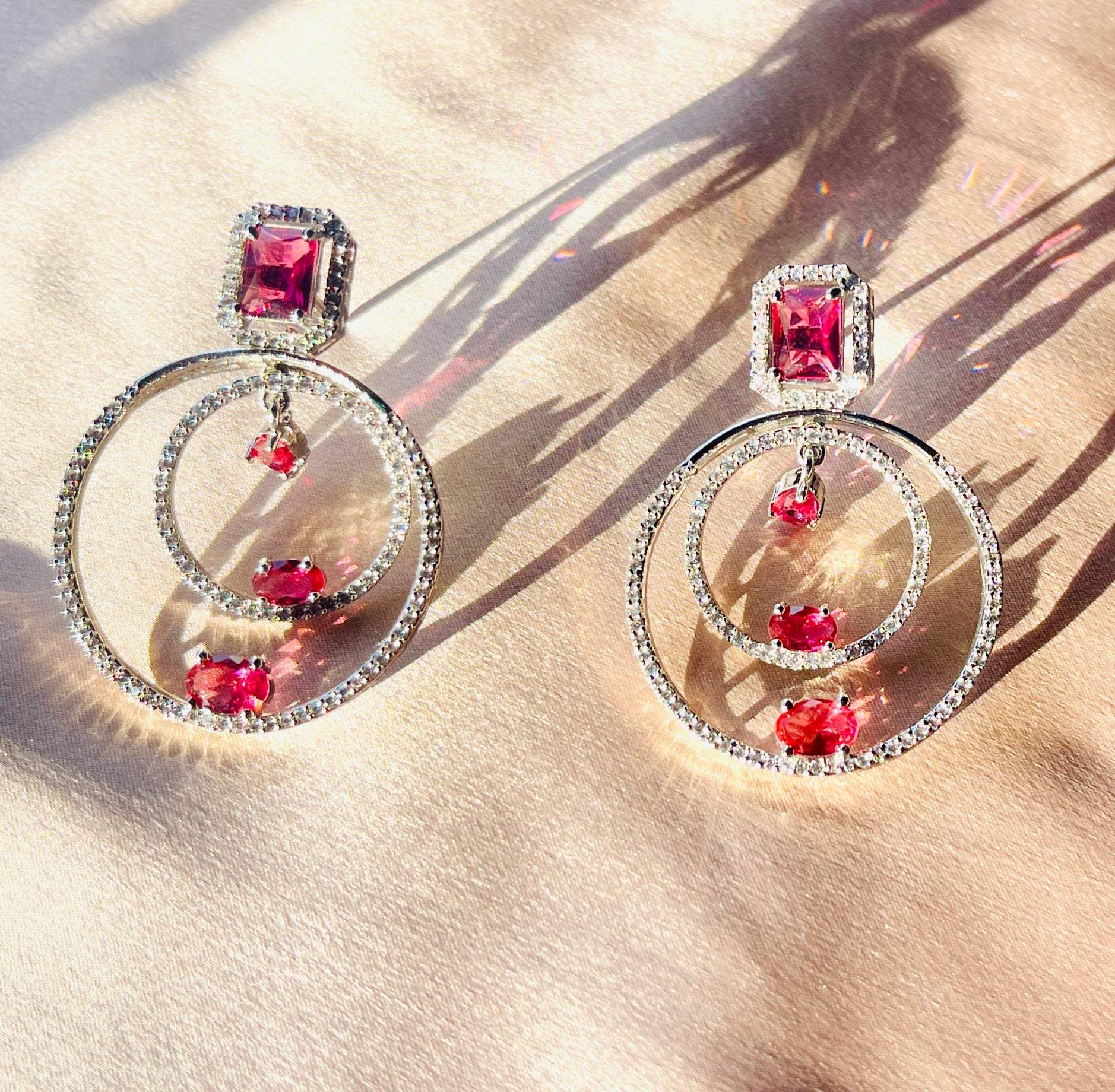 Silver and Red Concentric Circle Danglers - styled look