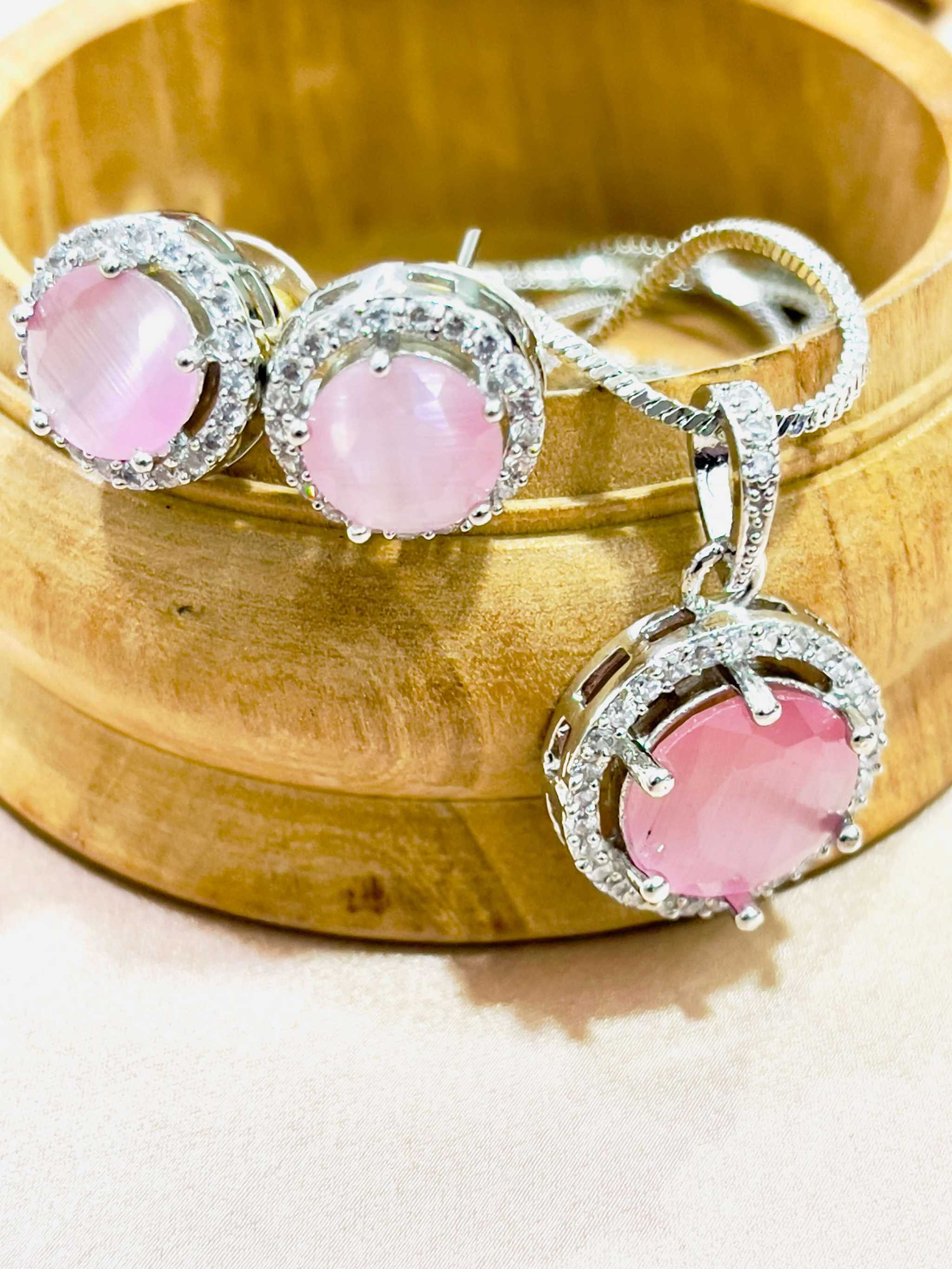 Pink Majestic Moonlit Circular grand pendant set with radiant pink gemstones and intricate silver detailing