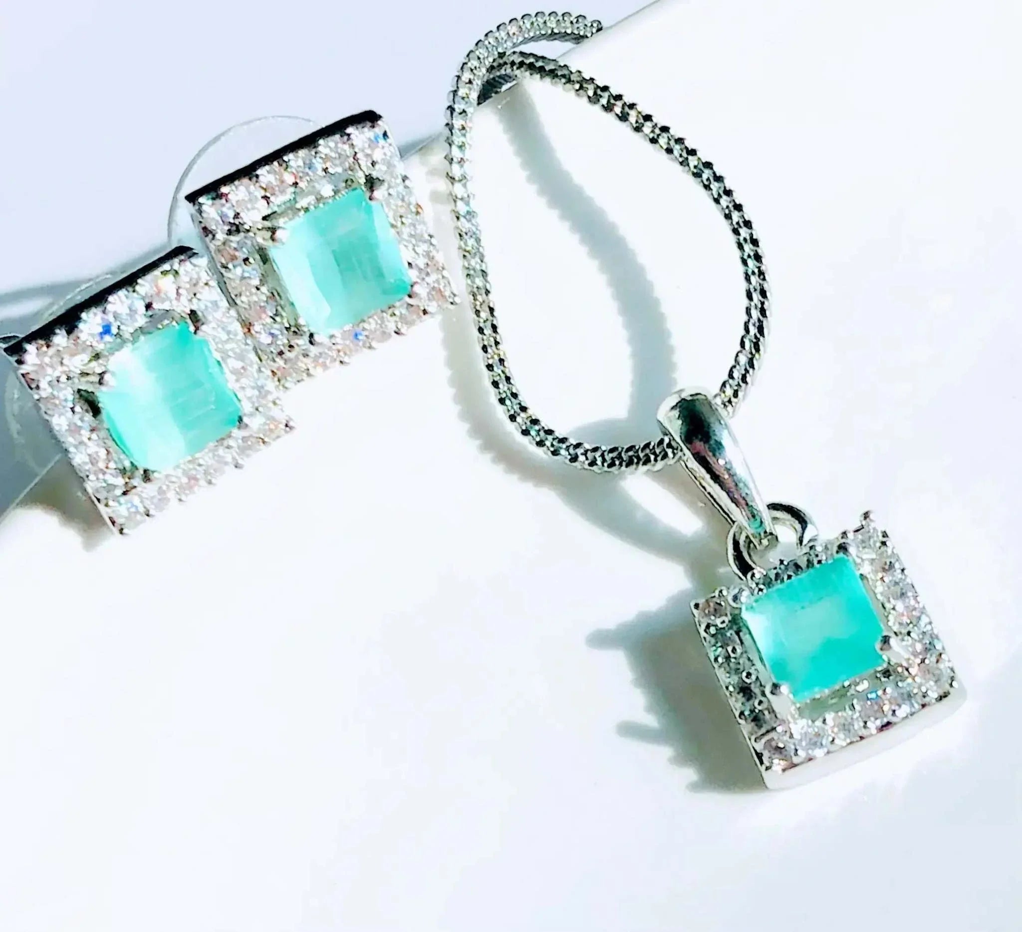 Teal and silver square pendant and matching earrings with sparkling accents on silver chain and studs