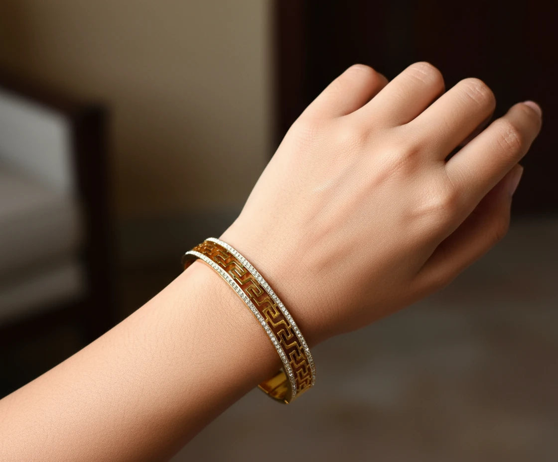 Gold AD Korean Bracelet with geometric pattern and anti-tarnish finish on textured surface