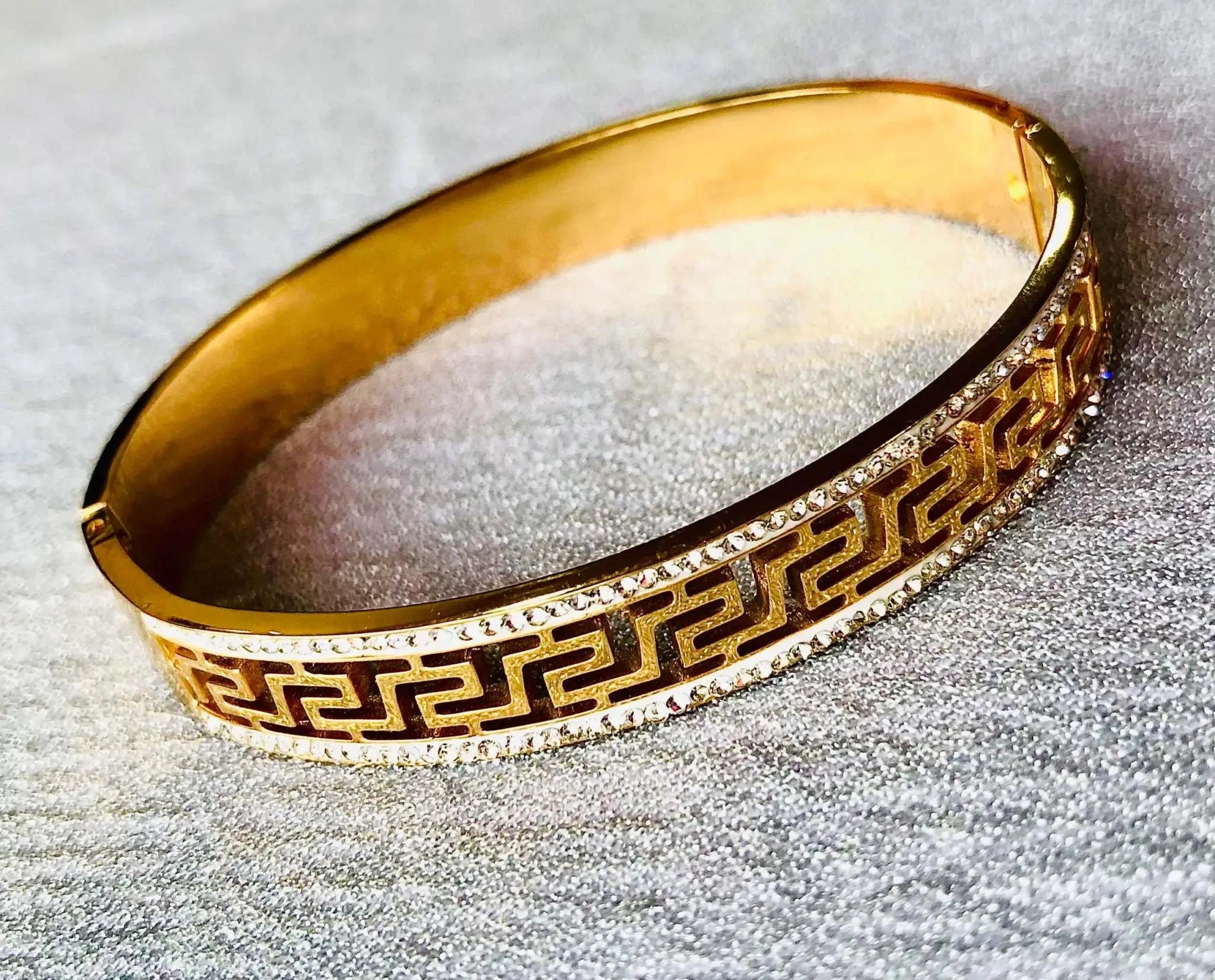 Gold AD Korean Bracelet with geometric pattern and anti-tarnish finish on textured surface