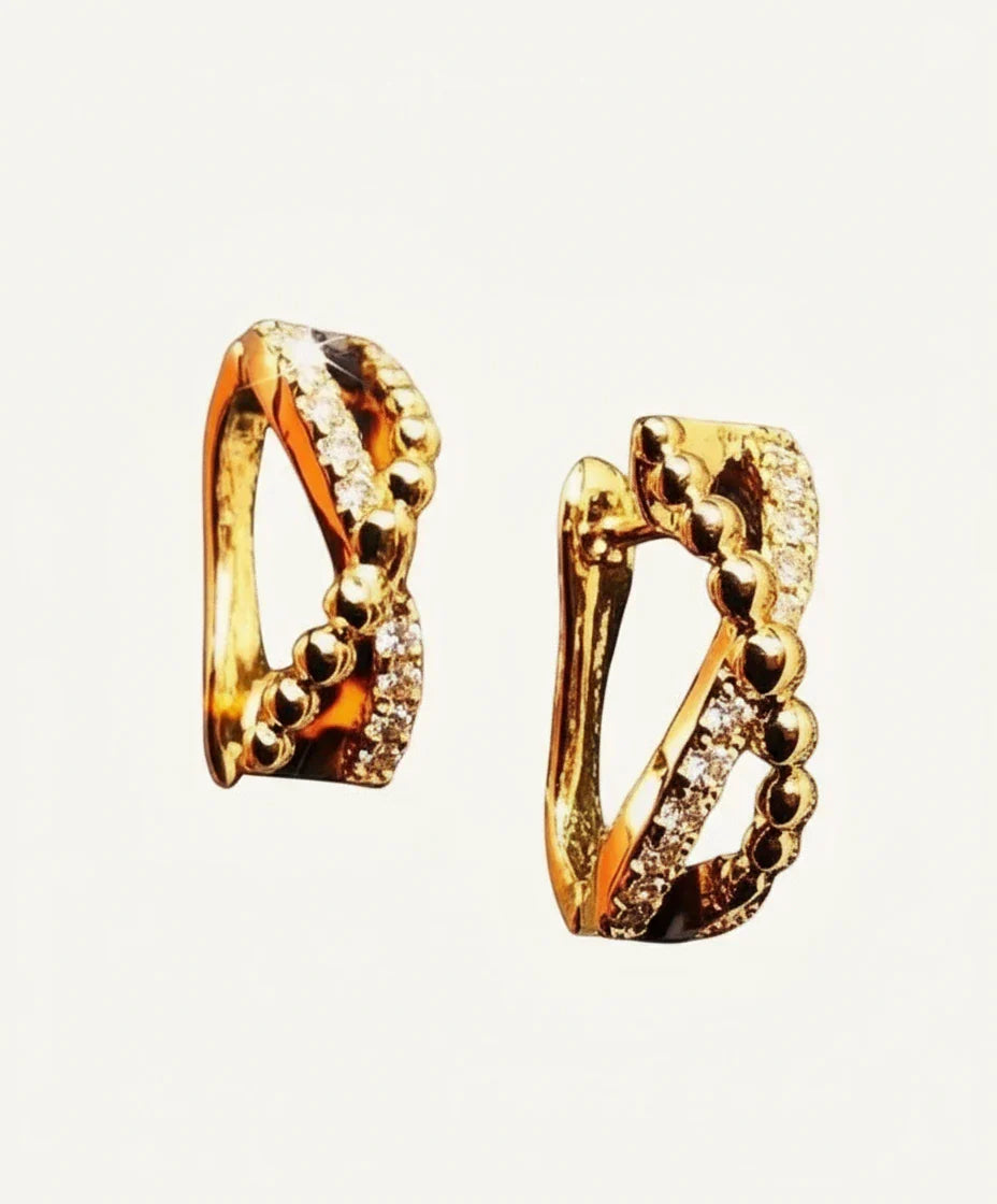 Rose Gold Infinity Stud Earrings with diamond accents in elegant infinity design